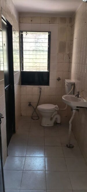 Bathroom in 1 BHK Apartment at Kailash Nath Nilgiri Gardens, Cbd Belapur Sector 24 – for Rent