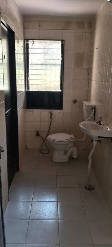 Bathroom in 1 BHK Apartment at Kailash Nath Nilgiri Gardens, Cbd Belapur Sector 24 – for Rent