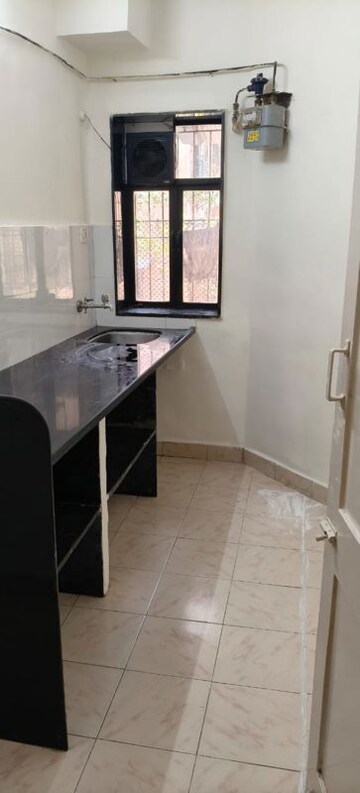 Kitchen in 1 BHK Apartment at Kailash Nath Nilgiri Gardens, Cbd Belapur Sector 24 – for Rent