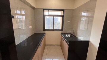 Kitchen in 1 BHK Apartment at Chandak Highscape City, Chembur – for Sale