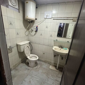 Bathroom in 1 BHK Builder Floor at Amrit Nagar – for Rent