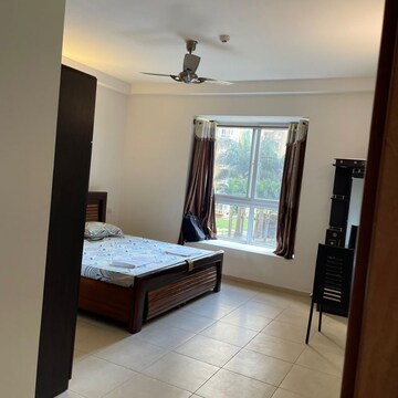 Bedroom in 3 BHK Apartment at Bhartiya Nikoo Homes, Kannur – for Rent