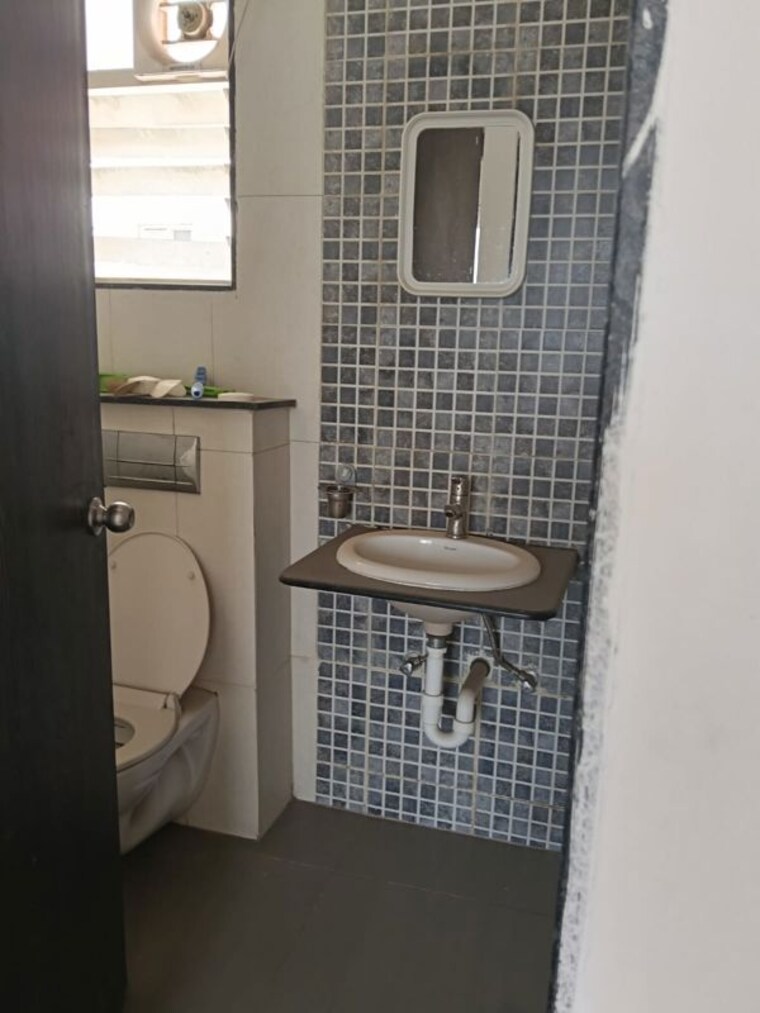 Bathroom, kolte-patil-life-republic 2 Bedroom 870 Sq.Ft. Apartment In Hinjewadi Pune 10028560