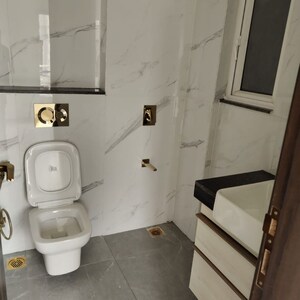 Bathroom in 3 BHK Apartment at Smart World Orchard, Sector 61 – for Sale