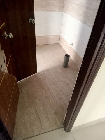 Bathroom in 3 BHK Apartment at Charms Castle Phase II, Raj Nagar Extension – for Sale