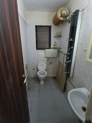 Bathroom in 3 BHK Apartment at Lokhandwala Whispering Palms, Kandivali East – for Rent
