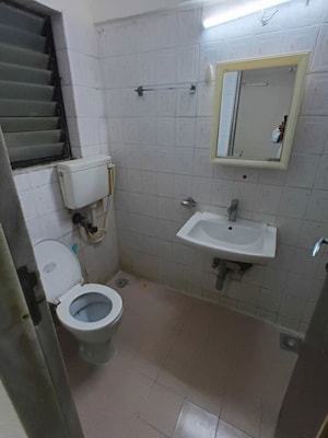 Bathroom in 3 BHK Apartment at Lokhandwala Whispering Palms, Kandivali East – for Rent