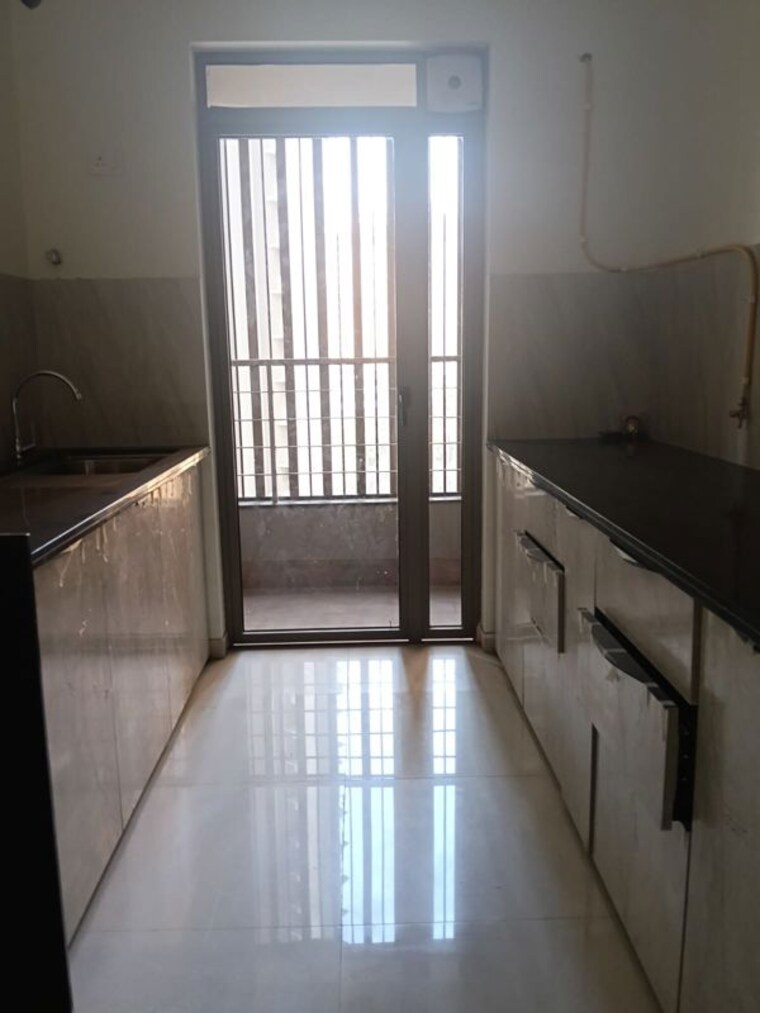 Kitchen, kalpataru-paramount-e 2 Bedroom 711 Sq.Ft. Apartment In Kapur Bawdi Thane 10028697