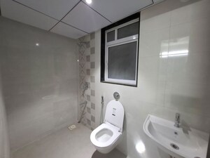 Bathroom in 2 BHK Apartment at Jhamtani Ace Abode, Kiwale – for Rent