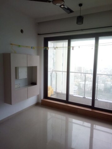 Room in 2.5 BHK Apartment at Rustomjee Elanza, Malad West – for Sale