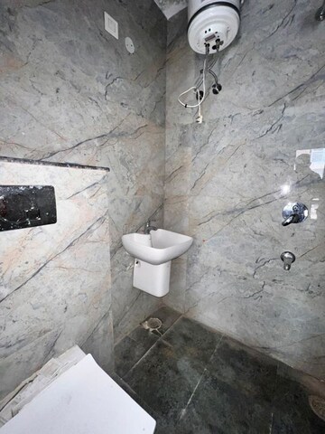 Bathroom in 3.5 BHK Apartment at Artique Uptown Skylla, International Airport Road – for Rent