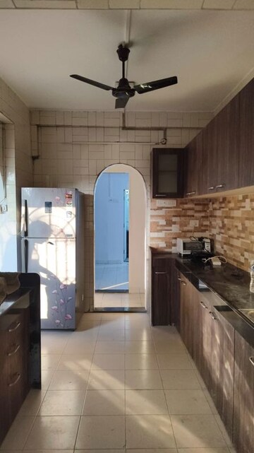Kitchen in 2 BHK Apartment at Karachi Citizens CHS, Juhu – for Rent