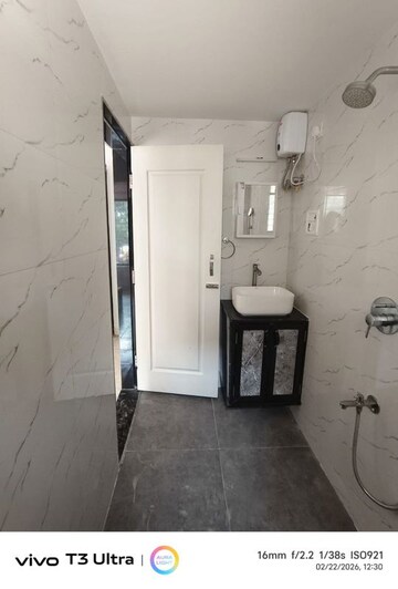 Bathroom in 2 BHK Apartment at Karachi Citizens CHS, Juhu – for Rent