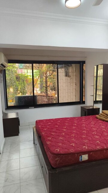 Bedroom in 2 BHK Apartment at Karachi Citizens CHS, Juhu – for Rent