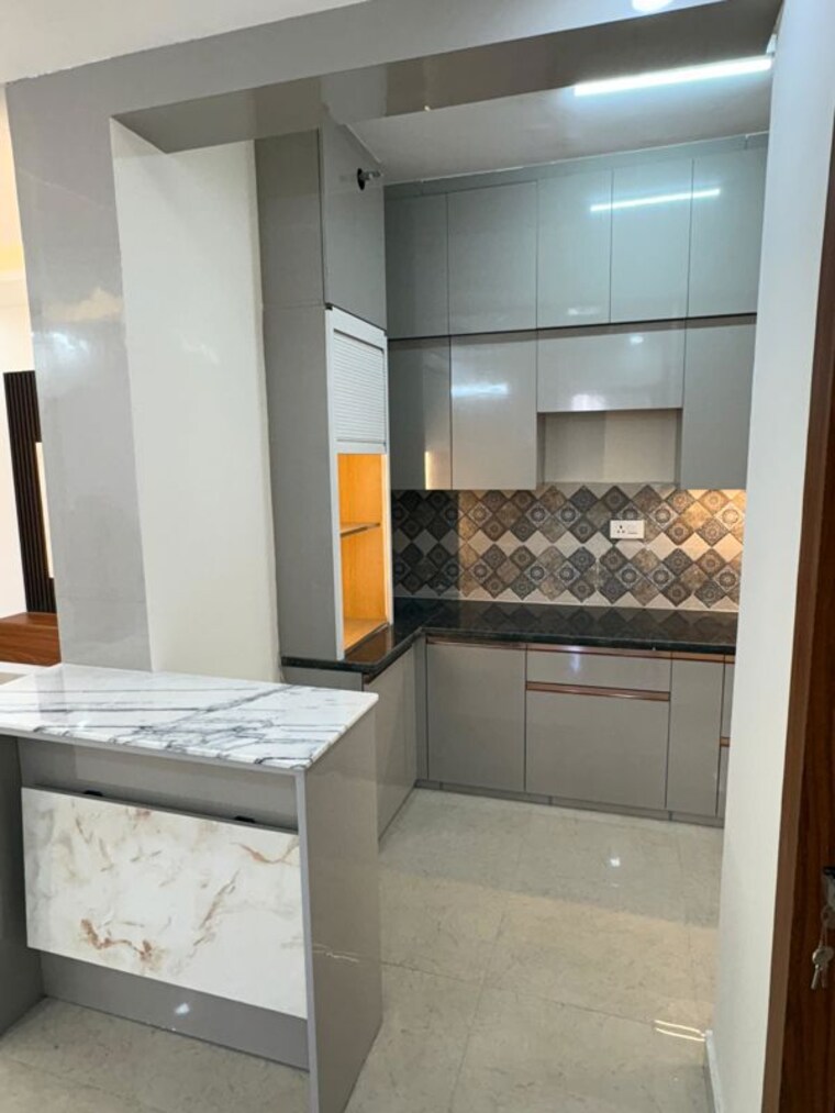 Kitchen, signature-global-the-millennia 2 Bedroom 1050 Sq.Ft. Apartment In Sector 37d Gurgaon 10029129