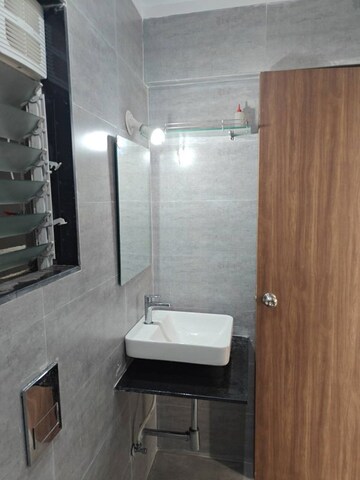 Bathroom in 1 BHK Apartment at Mahavir Square, Manpada – for Rent