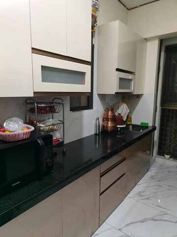 Kitchen in 1.5 BHK Apartment at Raymond Ten X Habitat, Pokhran Road No Two – for Sale