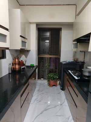 Kitchen in 1.5 BHK Apartment at Raymond Ten X Habitat, Pokhran Road No Two – for Sale