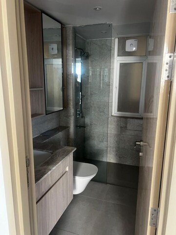 Bathroom in 3.5 BHK Builder Floor at DLF Gardencity Enclave, Sector 93 – for Rent