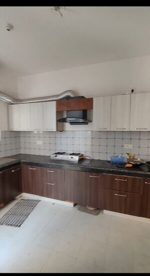 Kitchen in 2 BHK Apartment at Urban Axis Urban Woods, Sushant Golf City – for Rent