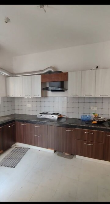 Kitchen in 2 BHK Apartment at Urban Axis Urban Woods, Sushant Golf City – for Rent