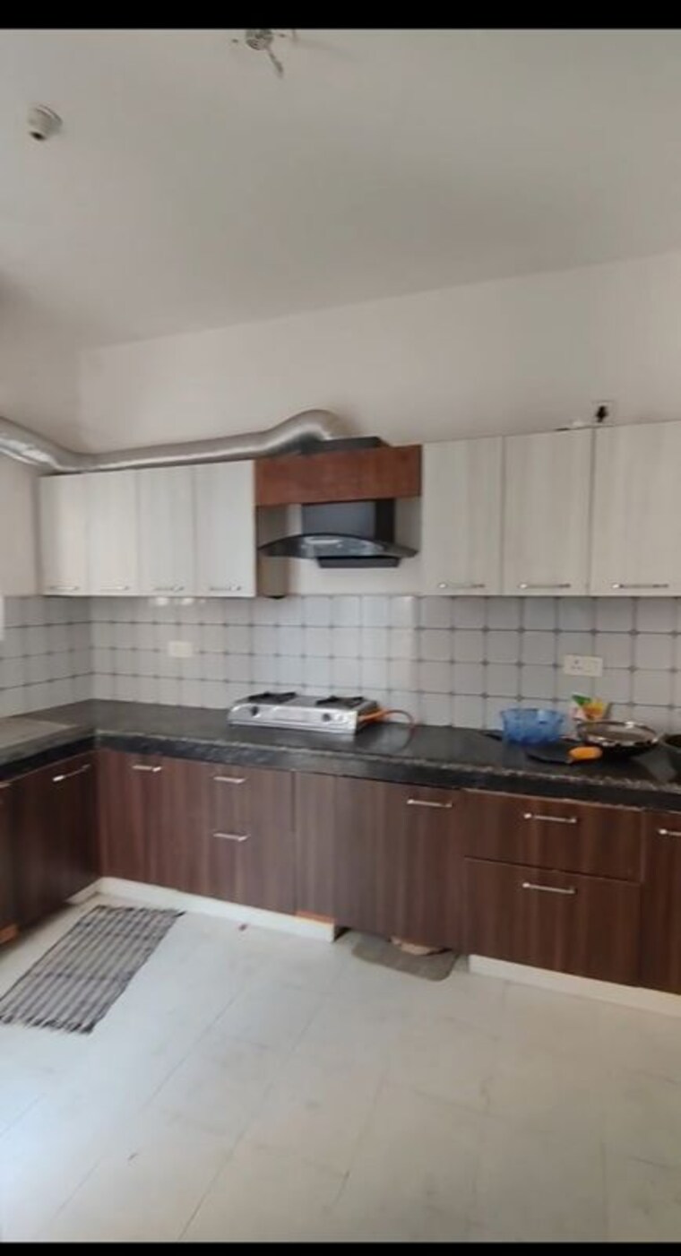 Kitchen, urban-axis-urban-woods 2 Bedroom 1150 Sq.Ft. Apartment In Sushant Golf City Lucknow 10029629