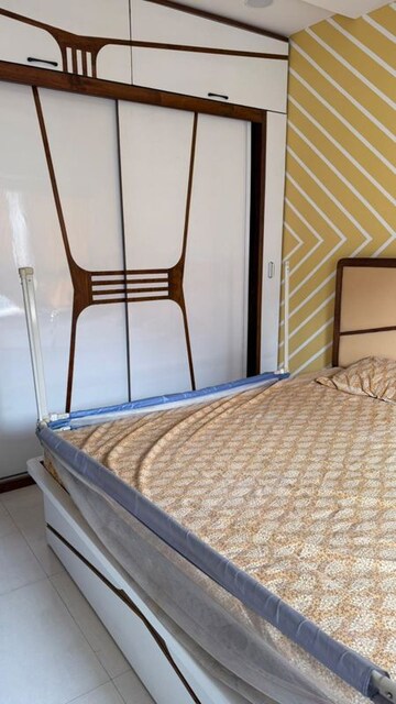 Bedroom in 2 BHK Apartment at Palladium Homes, Dhanori – for Rent