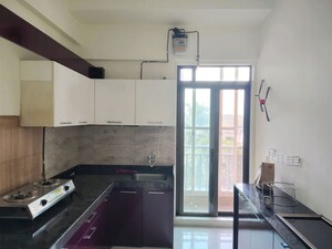 Kitchen in 1 BHK Apartment at Raunak Unnathi Greens, Kasarvadavali – for Rent