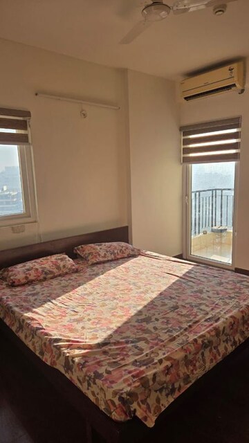 Bedroom in 3.5 BHK Apartment at Emaar Palm Gardens, Sector 83 – for Rent