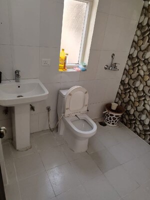 Bathroom in 2 BHK Apartment at Nimbus Express Park View, Chi V Greater Noida – for Rent