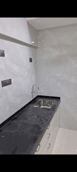 Bathroom in 1 BHK Apartment at Poonam Vaishno Heights, Malad East – for Rent