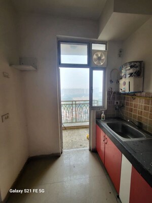 Kitchen in 3 BHK Apartment at Mahagun Mywoods, Sector 16c Greater Noida – for Sale