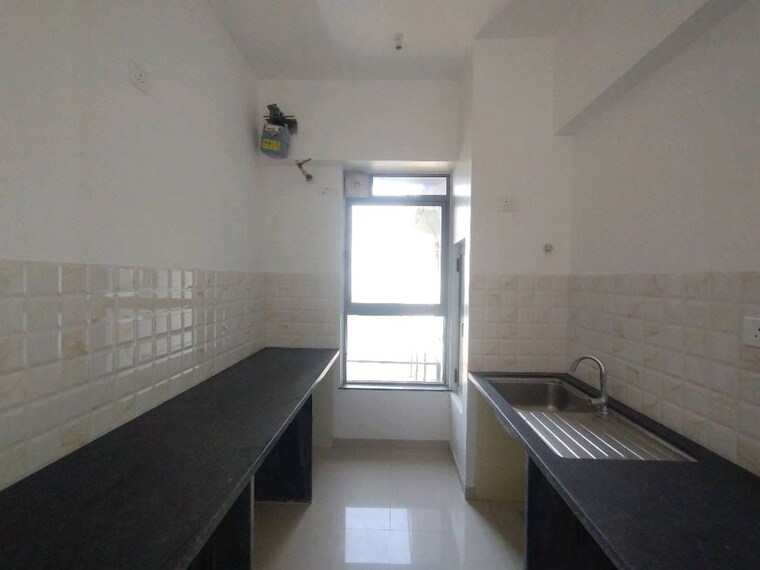 Kitchen, kalpataru-immensa 3 Bedroom 991 Sq.Ft. Apartment In Kolshet Road Thane 10030958