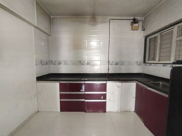 Kitchen in 1 BHK Apartment at Padmanabh Golden Valley, Dhayari – for Sale