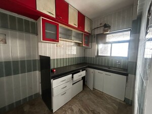 Kitchen in 3 BHK Apartment at Harmony Sky Suites, Ghodbunder Road – for Rent