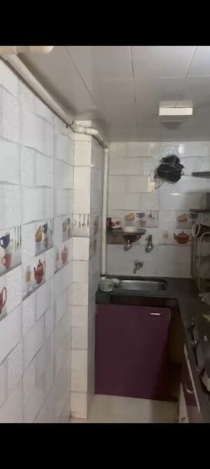 Kitchen in 1.5 BHK Apartment at Anant Nandadeep CHS, Jogeshwari East – for Rent