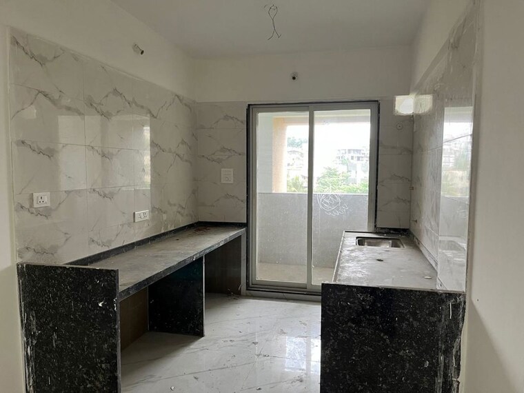 Kitchen, mahesh-ellanza 2 Bedroom 1000 Sq.Ft. Apartment In Vadgaon Budruk Pune 10031424