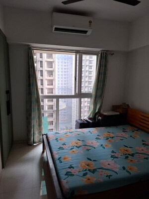 Bedroom in 2 BHK Apartment at Lodha Amara, Kolshet Road – for Rent