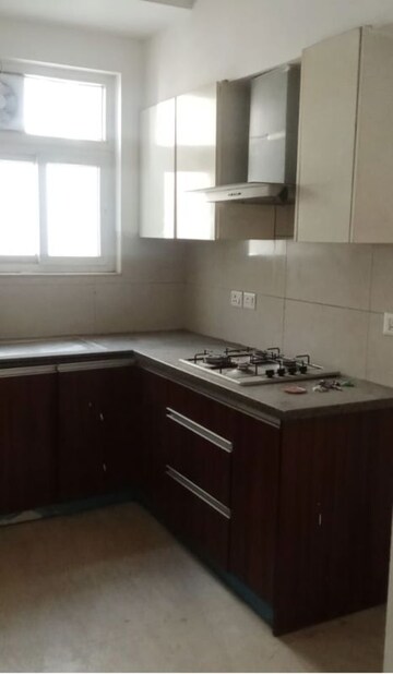 Kitchen in 3 BHK Apartment at Puri Aanandvilas, Sector 81 – for Rent