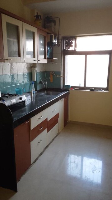 Kitchen in 1 BHK Apartment at Neelkanth Greens, Manpada – for Rent