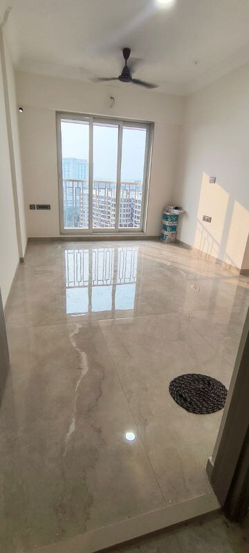 Living Room in 1 BHK Apartment at Crescent Silverwoods, Powai – for Rent