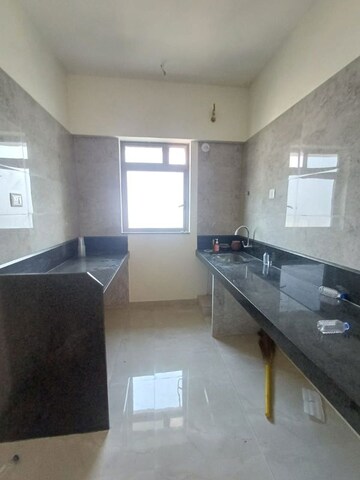 Kitchen in 1 BHK Apartment at Sheth Irene, Malad West – for Rent