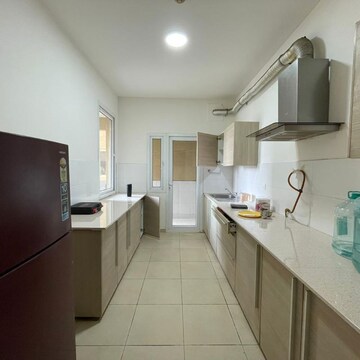 Kitchen in 3 BHK Apartment at Bhartiya Nikoo Homes, Kannur – for Rent