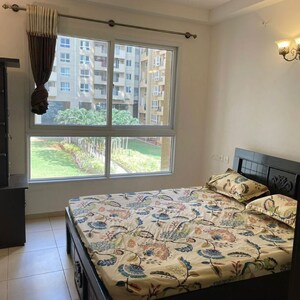 Bedroom in 3 BHK Apartment at Bhartiya Nikoo Homes, Kannur – for Rent