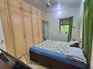 Bedroom in 3 BHK Apartment at Rajendra CHS, Andheri East – for Sale