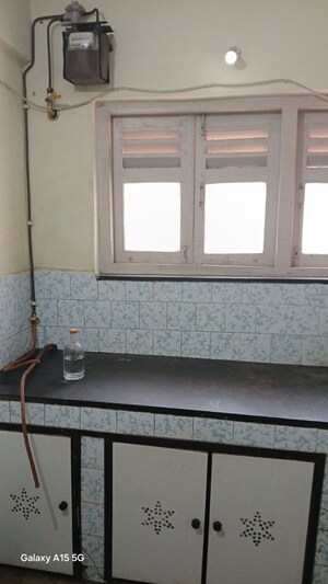Kitchen in 1 BHK Apartment at Jyoti Complex, Goregaon East – for Rent