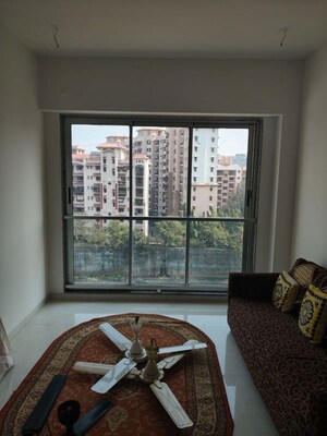 Living Room in 1 BHK Apartment at Naman Premier, Andheri East – for Rent