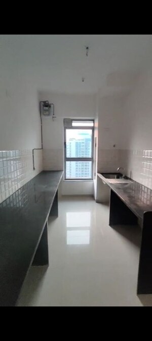 Kitchen in 2 BHK Apartment at Kalpataru Immensa, Kolshet Road – for Rent