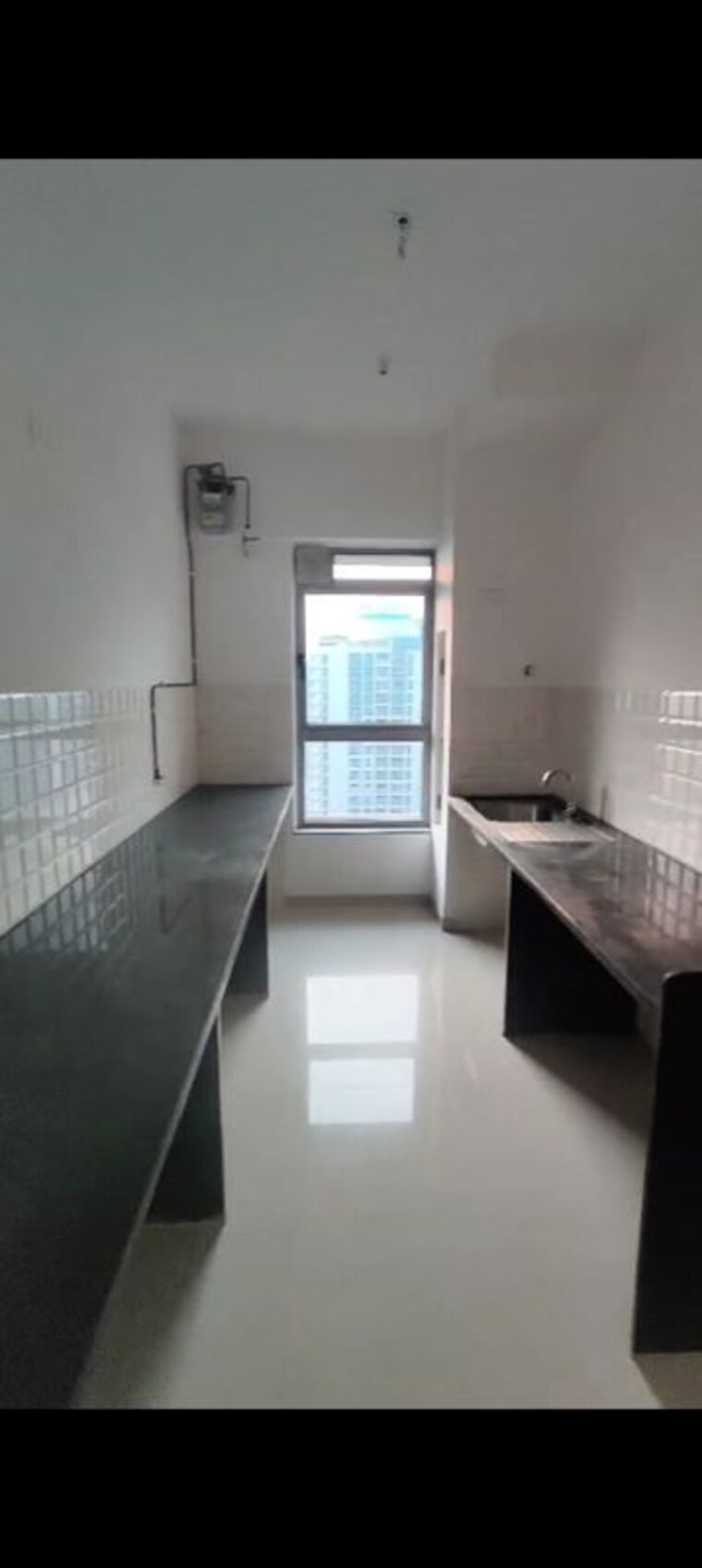 Kitchen, kalpataru-immensa 2 Bedroom 808 Sq.Ft. Apartment In Kolshet Road Thane 10032468