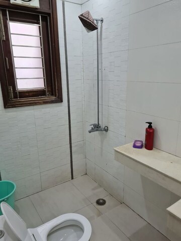Bathroom in 3 BHK Builder Floor at Nehru Enclave – for Rent